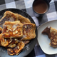 Flaky Almond Pancakes with mug of hot cocoa